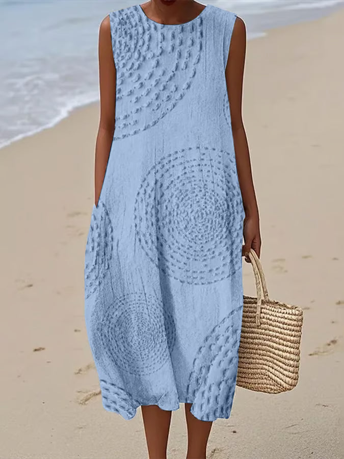 Maxi beach dress with elegant finishing and delicate straps, featuring a flowing silhouette and layered design. 2