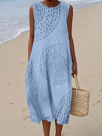 Maxi beach dress with elegant finishing and delicate straps, featuring a flowing silhouette and layered design. 2
