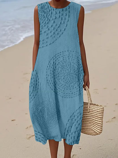 Maxi beach dress with elegant finishing and delicate straps, featuring a flowing silhouette and layered design. 3