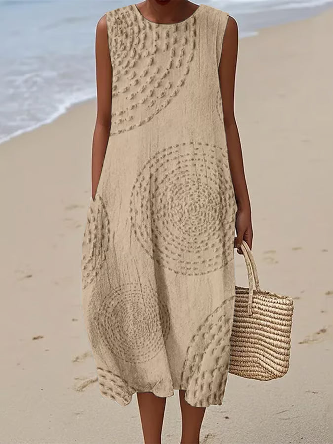 Maxi beach dress with elegant finishing and delicate straps, featuring a flowing silhouette and layered design. 4