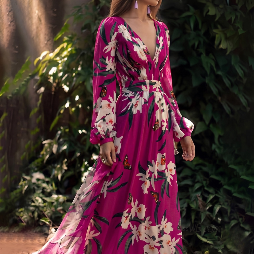 A women's dress featuring a floral pattern and a flowing silhouette, designed with short sleeves and a knee-length cut. 1