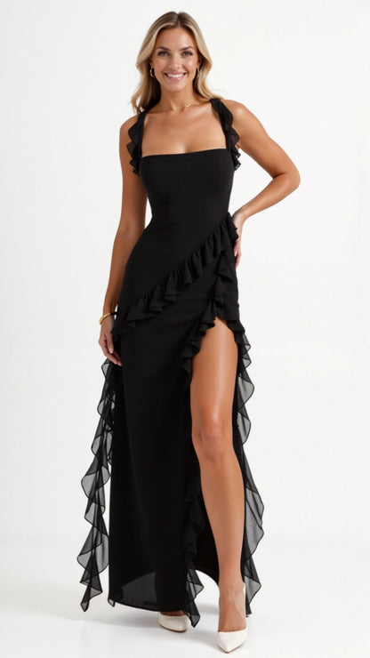 Maxi evening dress featuring ruffles and a side slit, designed for women. 1