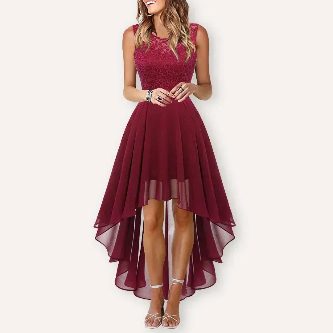 Elegant midi dress for women featuring a high waist and an asymmetrical hemline. 1