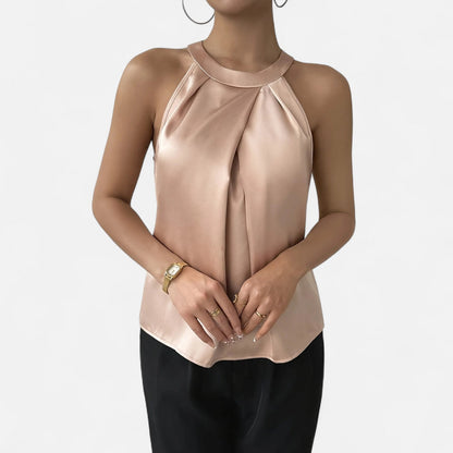 Women's sleeveless vest featuring a pleated front and draped pattern design. 3