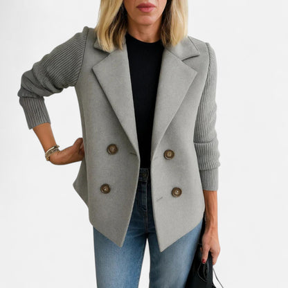 Elegant women's winter coat featuring a classic cut and comfortable fit, displayed on a hanger against a neutral background. 7