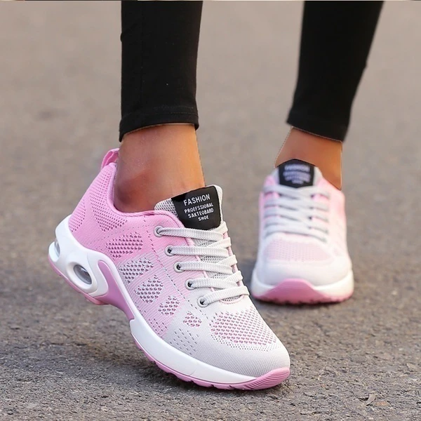 Damskie buty do biegania z oddychającą cholewką i wspierającą konstrukcją, ukazujące 2