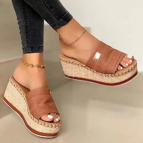 Women's wedge espadrilles featuring a woven sole and a wide strap. 0