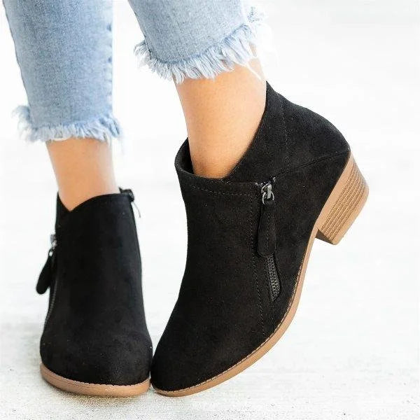 Low women's leather shoes with a zipper and arch support, featuring a sleek design and a comfortable fit. 1