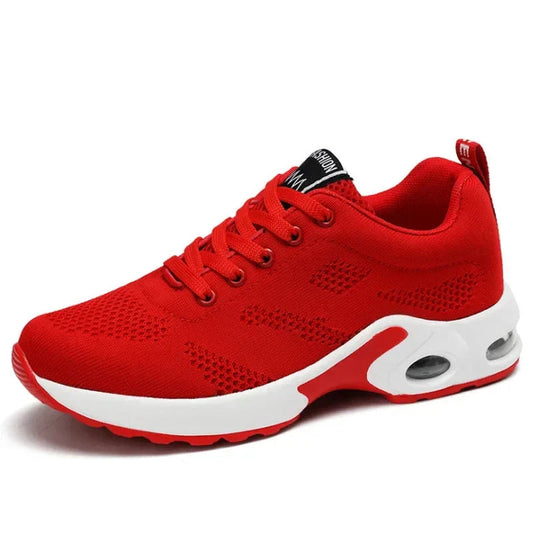 Sport shoes for women featuring a thick sole, showcasing a blend of pink and navy colors. 0