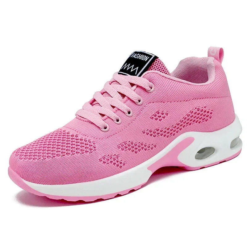 Sport shoes for women featuring a thick sole, showcasing a blend of pink and navy colors. 10