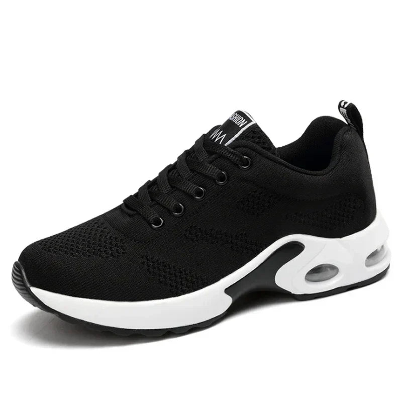 Sport shoes for women featuring a thick sole, showcasing a blend of pink and navy colors. 11