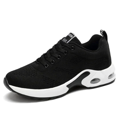Sport shoes for women featuring a thick sole, showcasing a blend of pink and navy colors. 11
