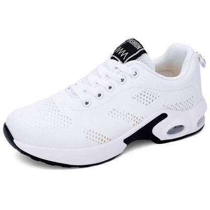 Sport shoes for women featuring a thick sole, showcasing a blend of pink and navy colors. 9