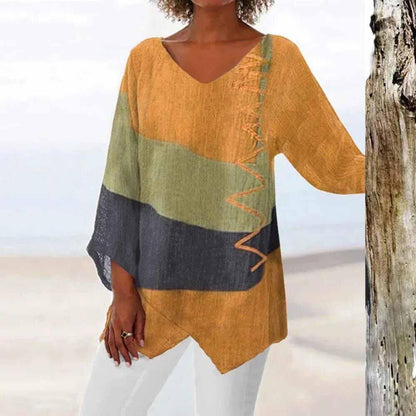 Three-color women's blouse with a classic cut, featuring a round neckline and short sleeves, displayed on a plain background. 1