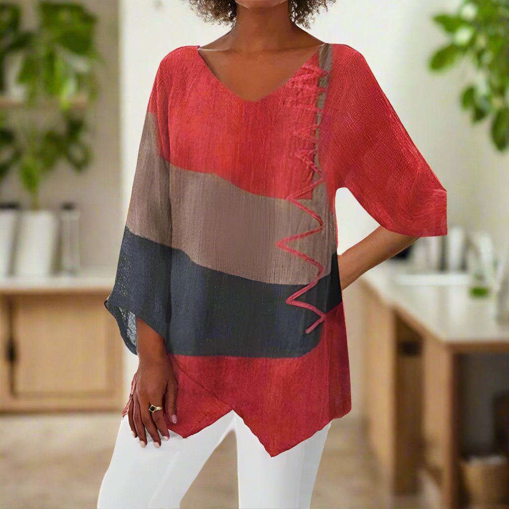 Three-color women's blouse with a classic cut, featuring a round neckline and short sleeves, displayed on a plain background. 4
