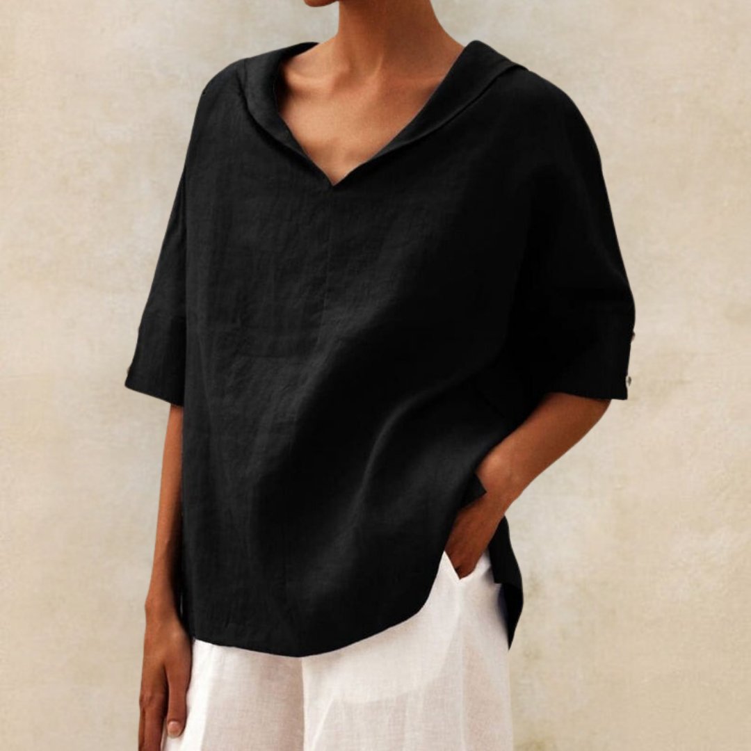 Loose women's top with a V-neck design, suitable for spring, featuring a relaxed fit and stylish silhouette. 6