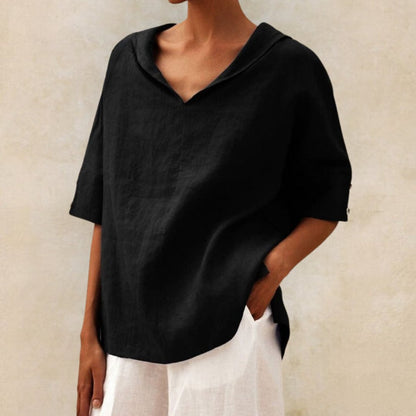Loose women's top with a V-neck design, suitable for spring, featuring a relaxed fit and stylish silhouette. 6