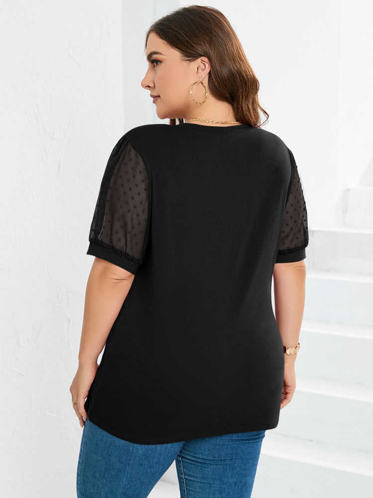Women’s top featuring a V-neckline and puff sleeves, designed for a stylish look. 3