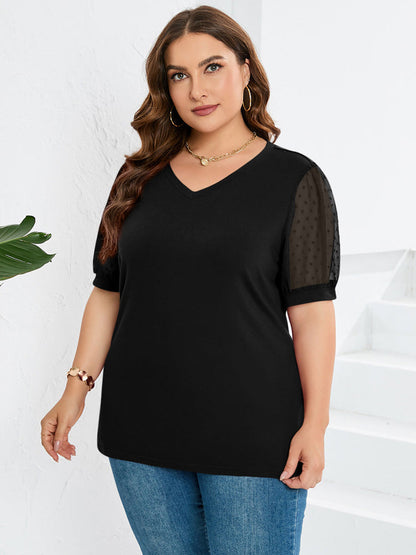 Women’s top featuring a V-neckline and puff sleeves, designed for a stylish look. 4