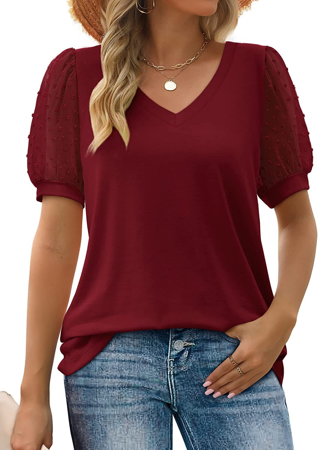 Women’s top featuring a V-neckline and puff sleeves, designed for a stylish look. 7