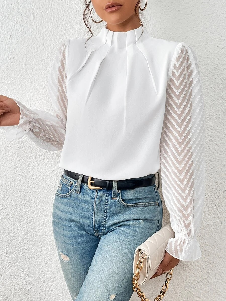 A women's top featuring pleated sleeves and a round neckline, displayed on a mannequin against a neutral background. 2