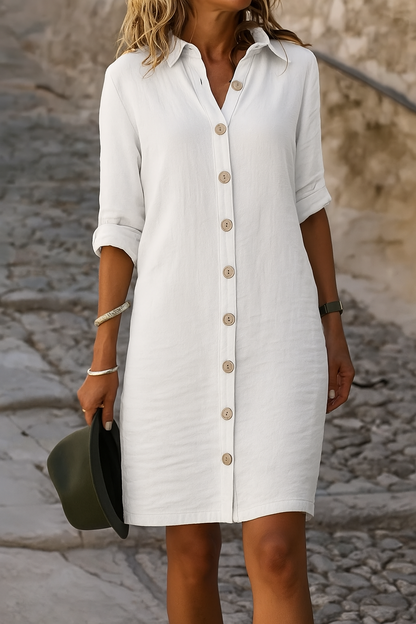 A spring dress for women featuring a V-shaped neckline, flowing silhouette, and short sleeves, displayed on a hanger against a neutral background. 12