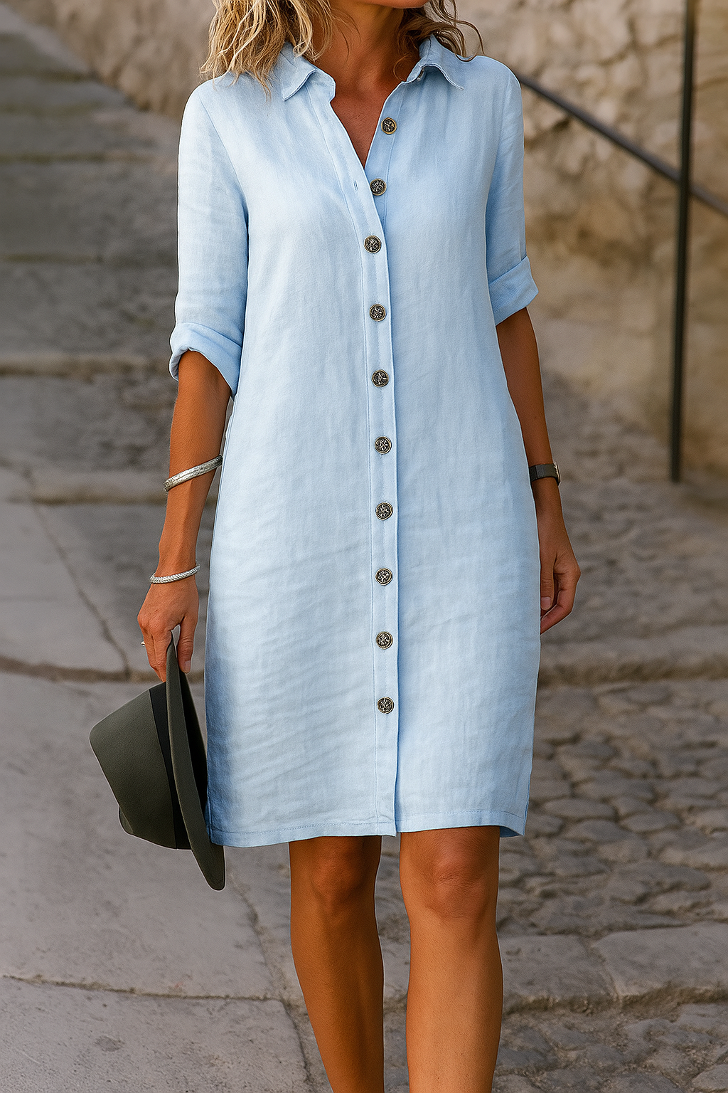 A spring dress for women featuring a V-shaped neckline, flowing silhouette, and short sleeves, displayed on a hanger against a neutral background. 14