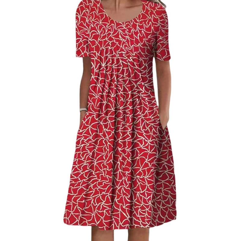 Floral dress with pockets and a flattering cut, displayed on a mannequin. 5