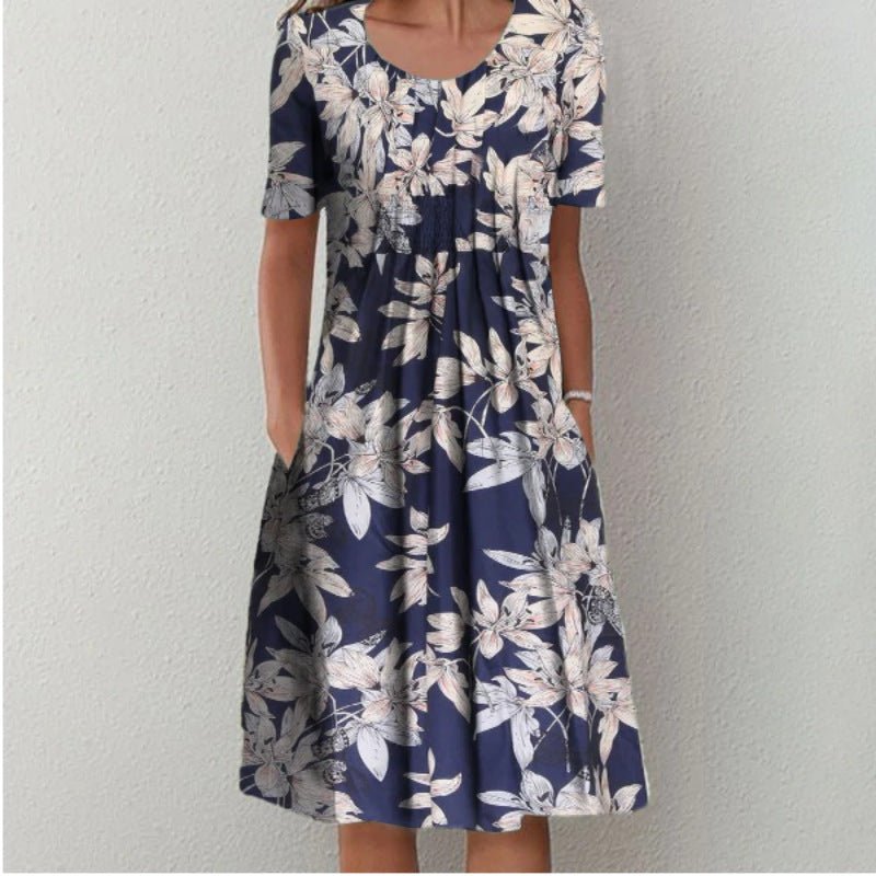Floral dress with pockets and a flattering cut, displayed on a mannequin. 6