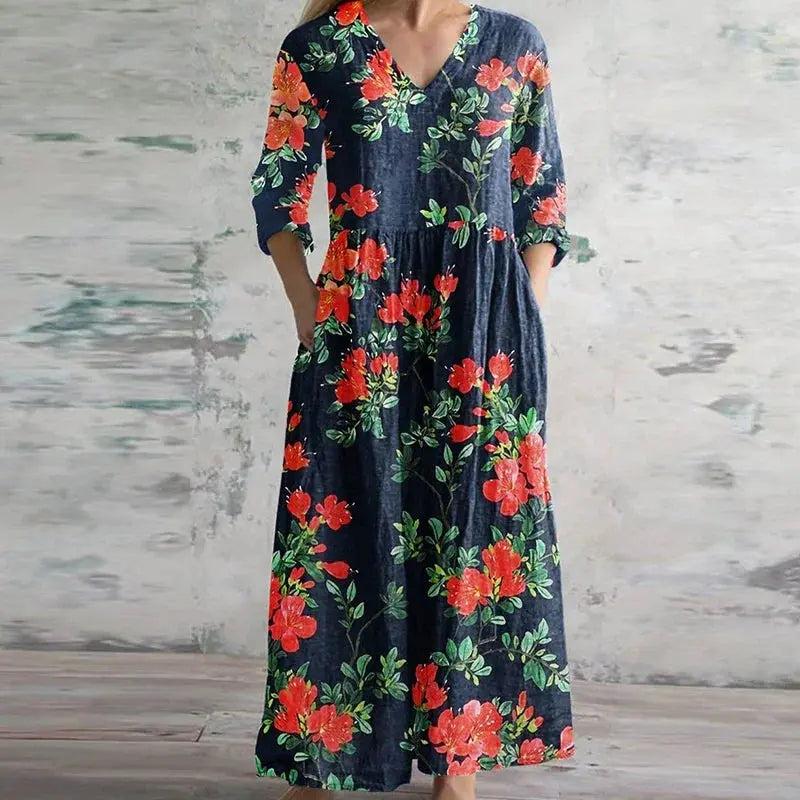 Maxi dress with a floral print and long sleeves, designed for summer wear. 3
