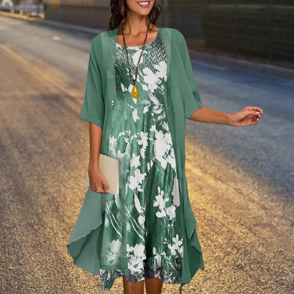 A long-sleeved evening dress displayed on a mannequin, featuring a fitted bodice and flowing skirt, showcasing its elegant design and comfortable fit. 5