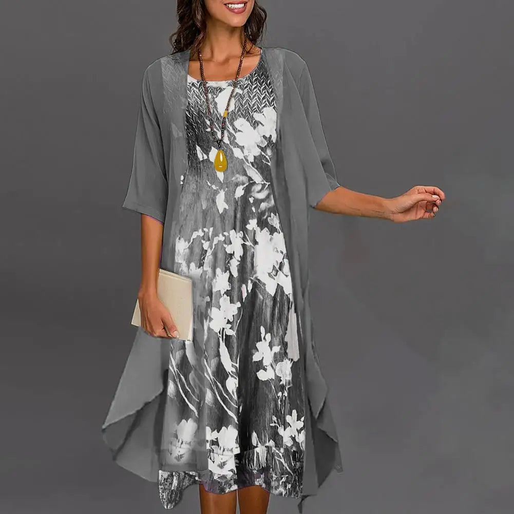 A long-sleeved evening dress displayed on a mannequin, featuring a fitted bodice and flowing skirt, showcasing its elegant design and comfortable fit. 7