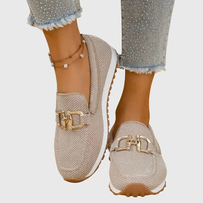 Orthopedic women's moccasins featuring metallic details and a non-slip sole. 0