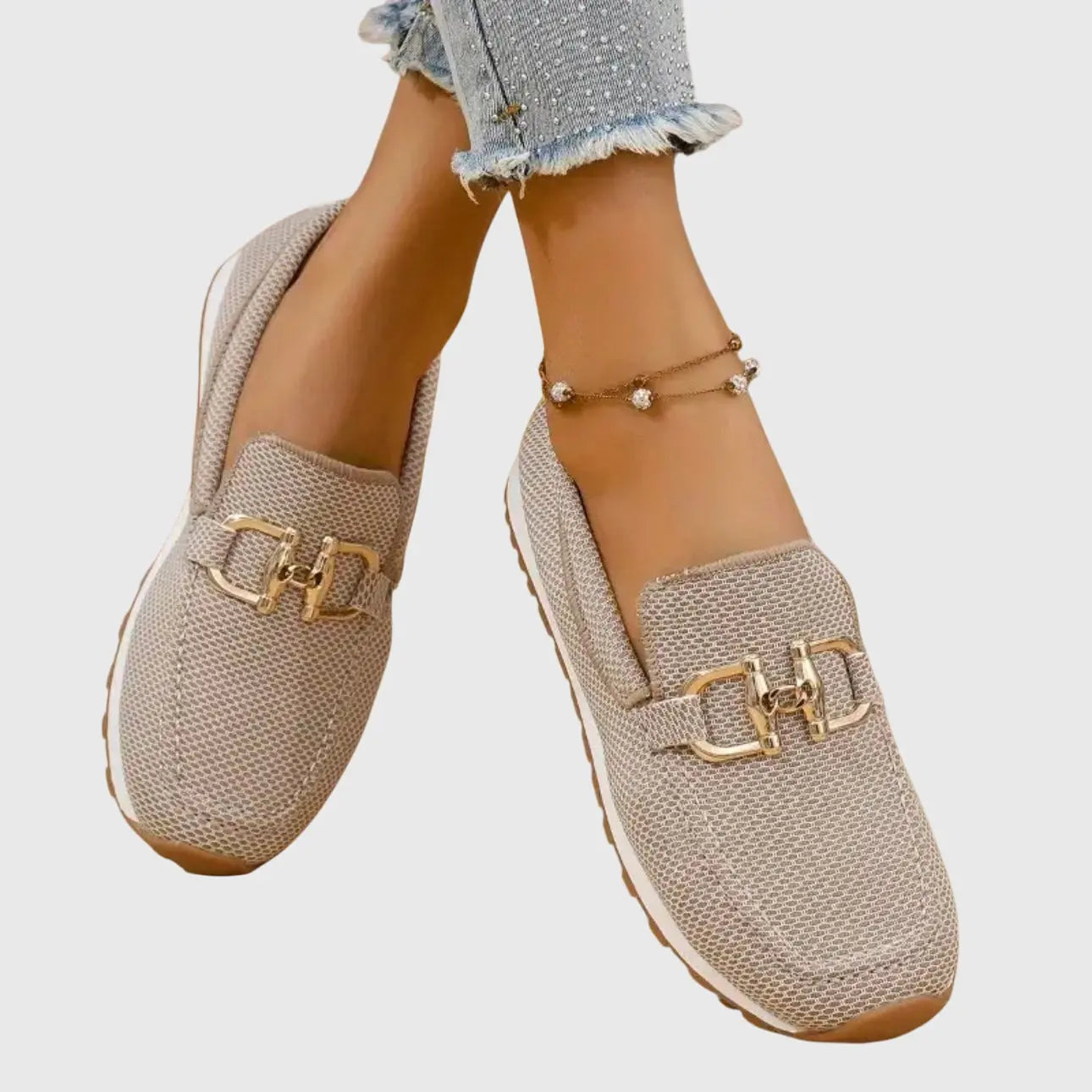 Orthopedic women's moccasins featuring metallic details and a non-slip sole. 1