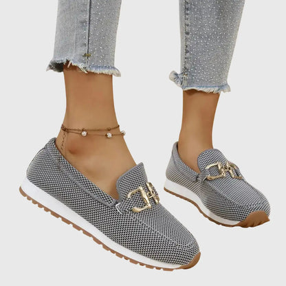 Orthopedic women's moccasins featuring metallic details and a non-slip sole. 5