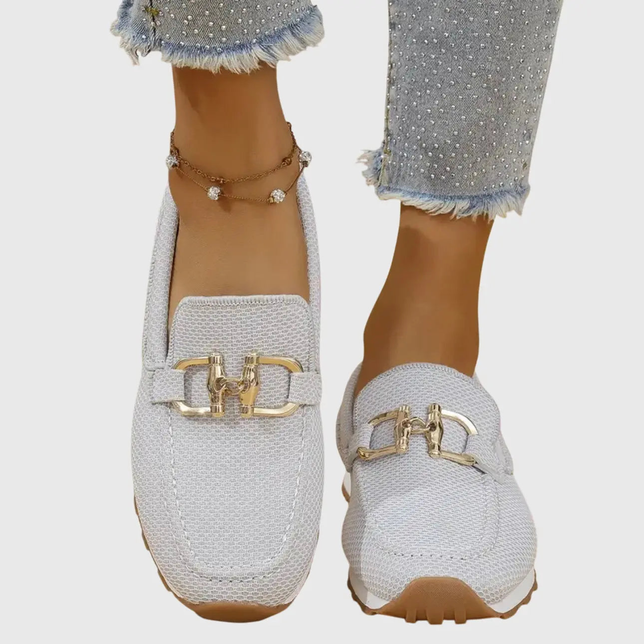 Orthopedic women's moccasins featuring metallic details and a non-slip sole. 6