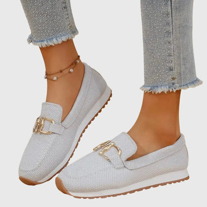Orthopedic women's moccasins featuring metallic details and a non-slip sole. 8