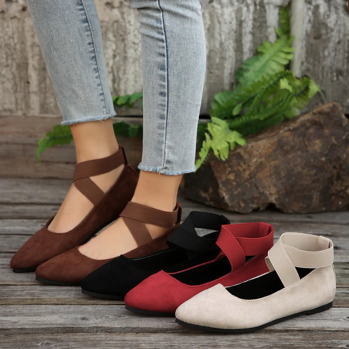 Flat women's wedge shoes with an elastic strap, showcasing a sleek design and comfortable fit. 7