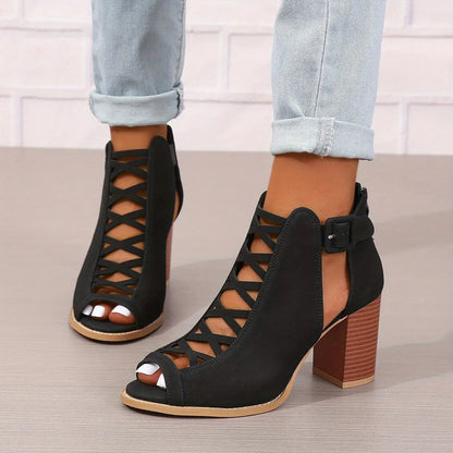 A pair of women's lace-up sandals with a block heel, featuring a strappy design and an open toe. 3