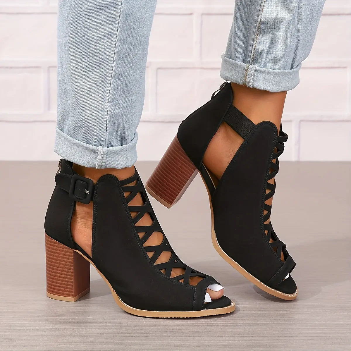 A pair of women's lace-up sandals with a block heel, featuring a strappy design and an open toe. 6