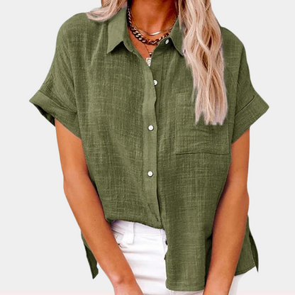 Elegant women's shirt featuring a collar and short sleeves. 1