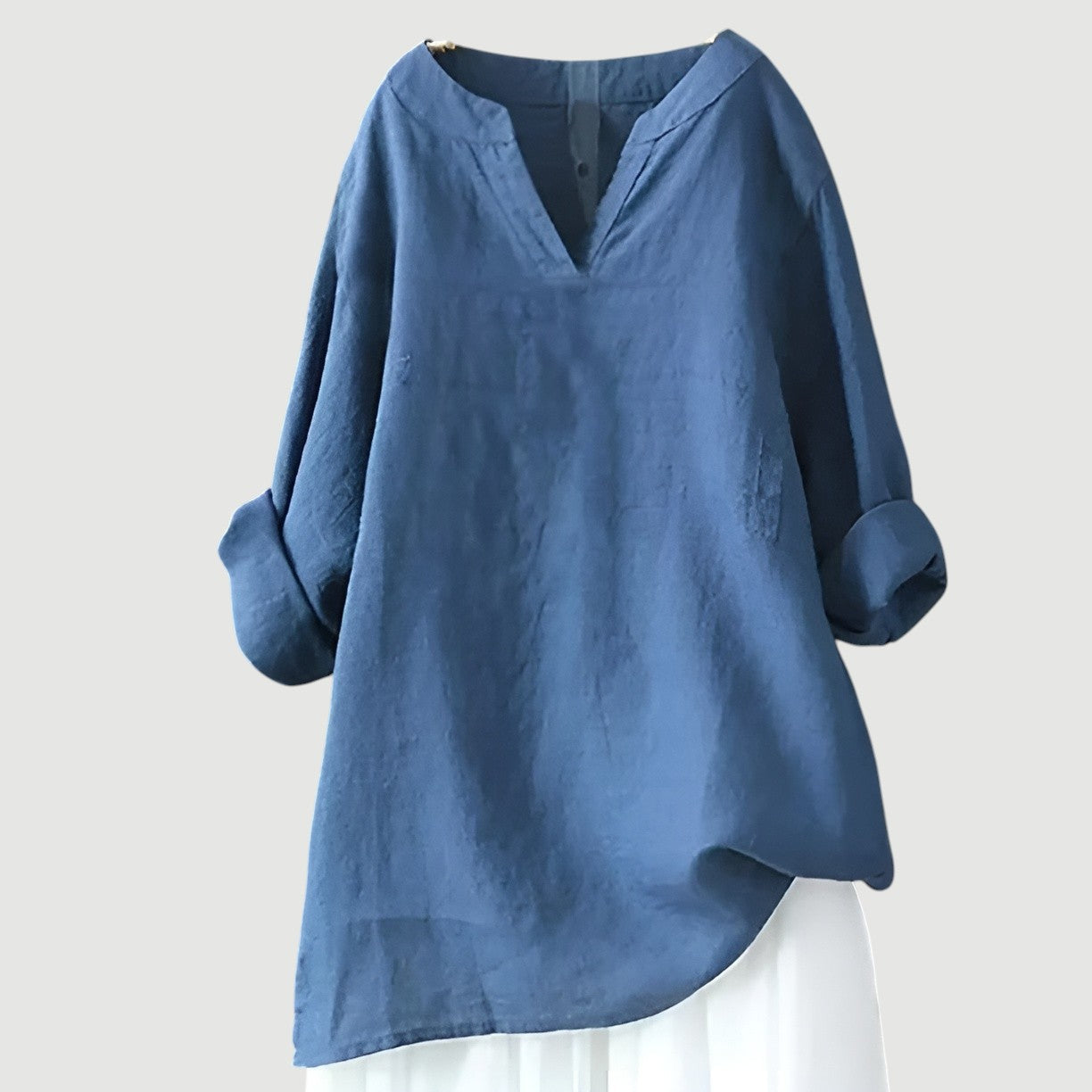 Oversized women's shirt with a classic neckline, designed for warm days, featuring a relaxed fit and short sleeves. 0