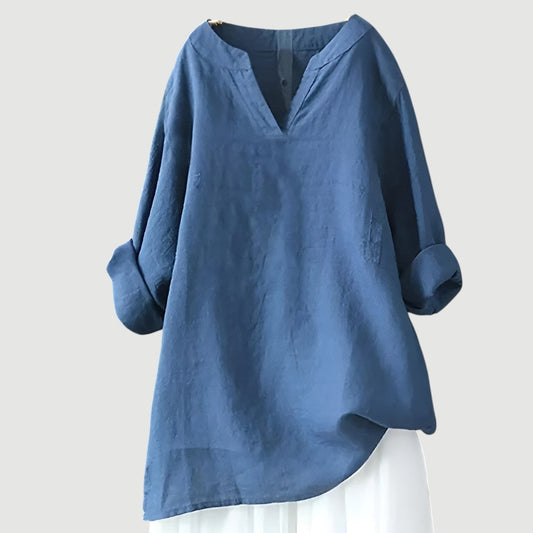 Oversized women's shirt with a classic neckline, designed for warm days, featuring a relaxed fit and short sleeves. 0