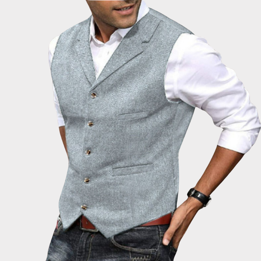 Men's casual vintage vest featuring a button closure and a relaxed fit. 1
