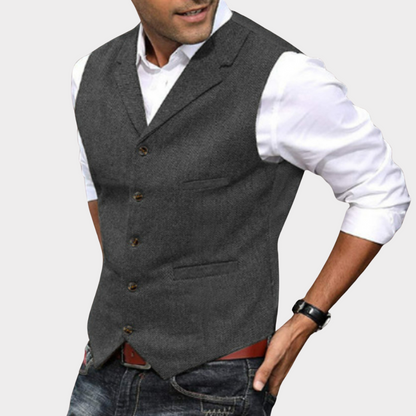 Men's casual vintage vest featuring a button closure and a relaxed fit. 2