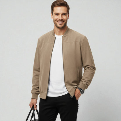 Men's bomber jacket with a minimal tech design, featuring a collarless style and regular fit. 3