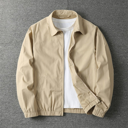 Men's lightweight jacket featuring a zip closure and elastic cuffs. 0