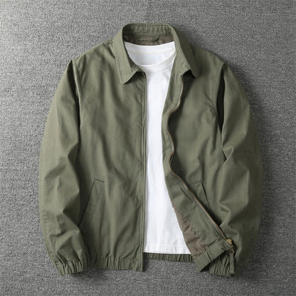 Men's lightweight jacket featuring a zip closure and elastic cuffs. 1
