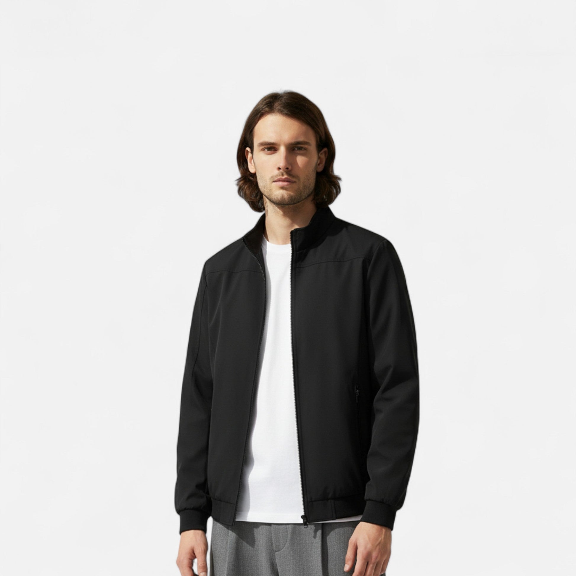 Men's lightweight jacket featuring a high collar and a zip closure. 1