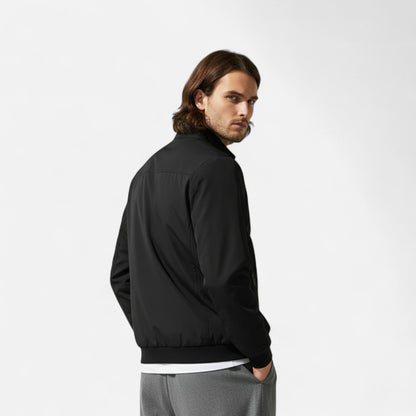 Men's lightweight jacket featuring a high collar and a zip closure. 2